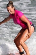 Christine Taylor in Hawaii trying a little surfing in a Bikini and Wet Top ...